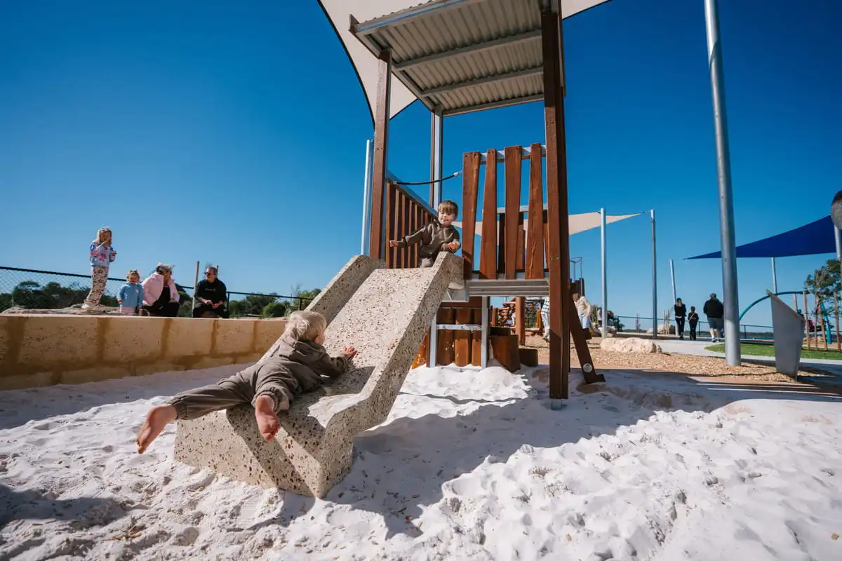 Child on a slide in Southeast Dawesville Foreshore playground